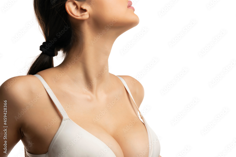 female large breasts in a white bra female large breasts in a white bra