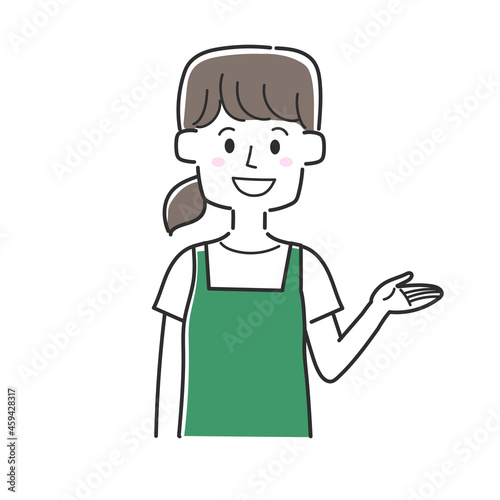 案内をしているエプロンを着た店員