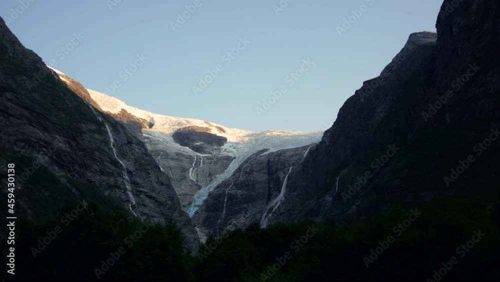 Norwegian glacier, clear sky, sun set Norwegian glacier, clear sky, sun set