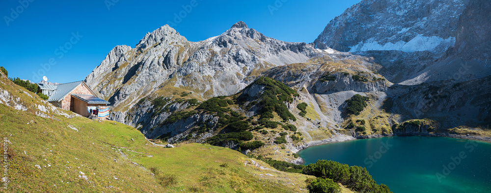 hiking destination lake Drachensee, Mieminger Alps, with hut and pasture