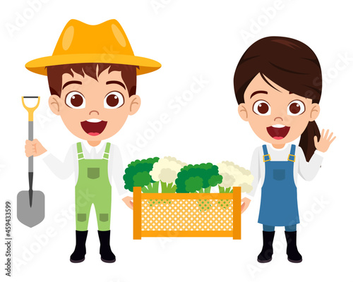 Happy cute kid boy and girl farmer character standing and holding vegetables box together