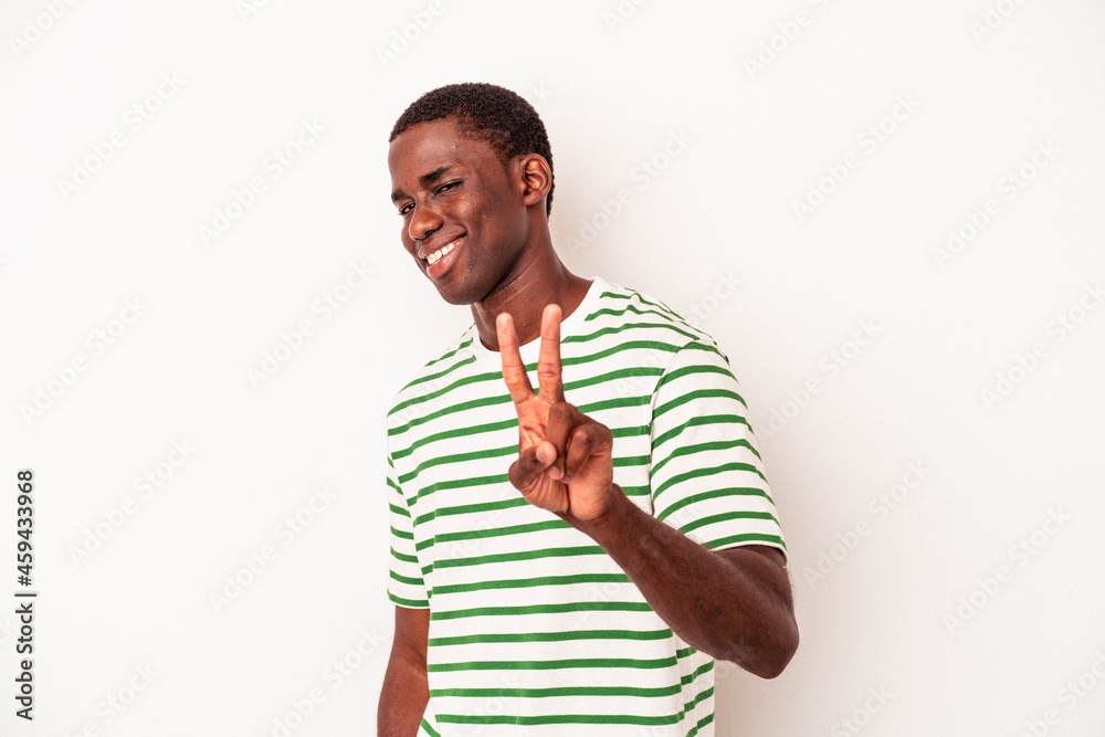 Young African American man isolated on white background showing number two with fingers. Young African American man isolated on white background showing number two with fingers.