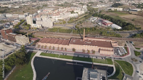 Cais da Fonte Nova, piers and Ria de Aveiro against cityscape. Aerial view