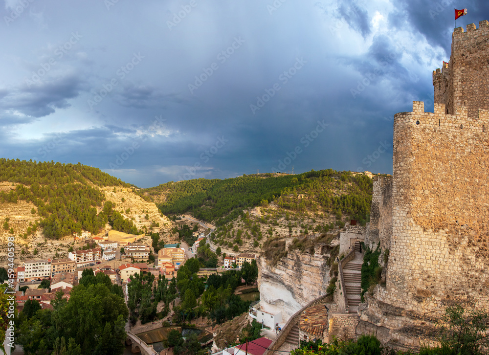 Castle and town of Alcala del Jucar, castilia la Mancha, Spain, lying in a gorge of the Jucar river