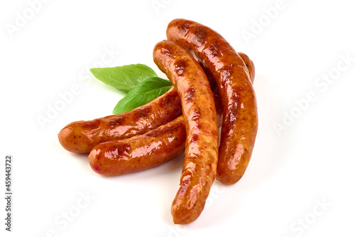 Grilled bbq sausages on the barbecue, isolated on white background.