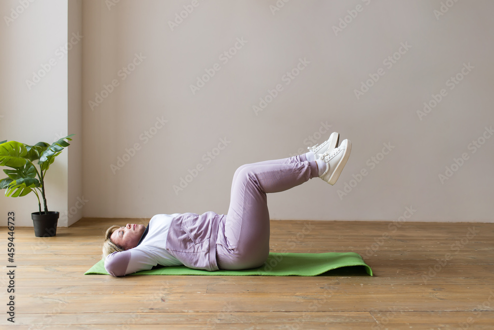 Fototapeta premium woman goes in for sports. Charges.