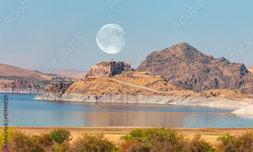 Pertek castle located in Pertek district of Tunceli - Pertek, Turkey Keban dam lake in the foreground 