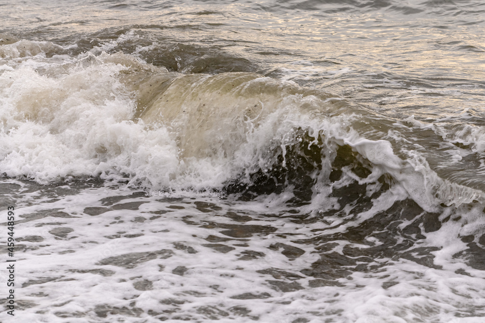 white sea foam near the shore close-up, waves white sea foam near the shore close-up, waves