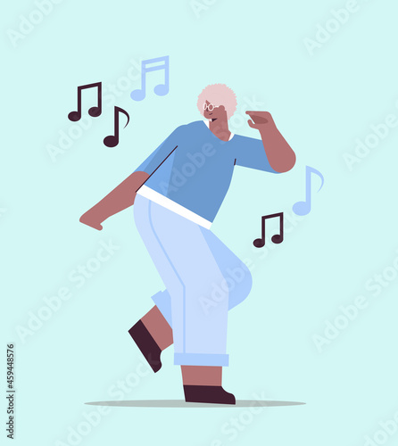 senior african american woman dancing and singing grandmother having fun active old age concept