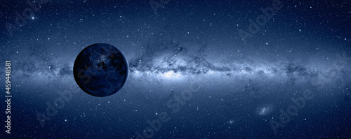 View of Earth from outer space with millions of stars around it 