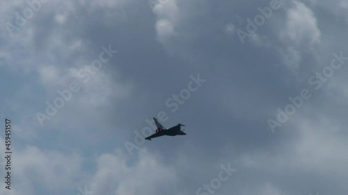 Dassault Rafale (French: Dassault Rafale, Flurry) - fourth-generation French multi-role fighter performs aerobatics in afterburner in Moscow sky. Close-up. Zhukovsky, Russia, August 9, 2012. 
