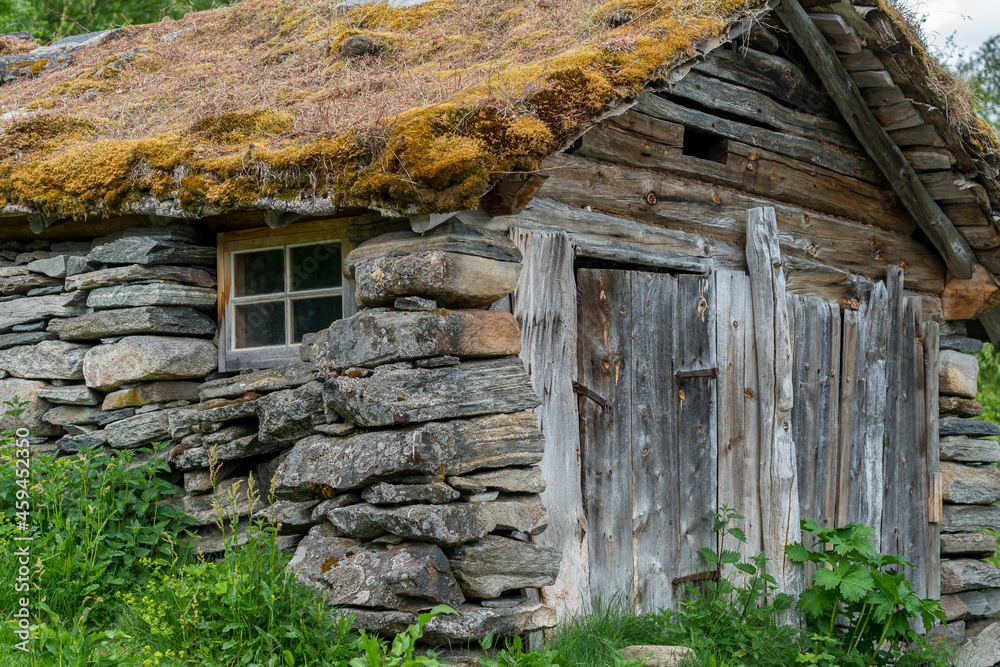 Old stone cottage Homlongfarm in the mountain of Norway.