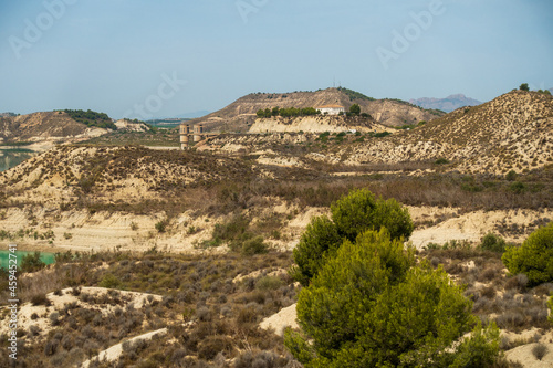 Panoramic shot of the landscape near reservoir la Pedrera at Torremendo, Spain photo