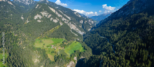 Aerial view around the village Scharans in Switzerland on a sunny day in summer.