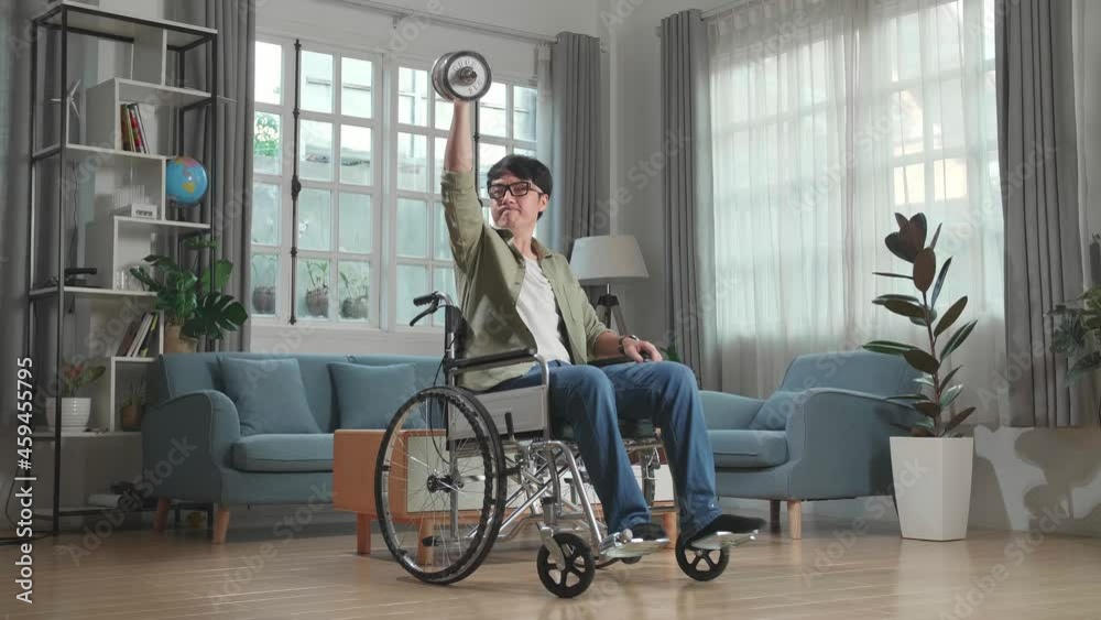 Asian Man Sitting In A Wheelchair And Exercising With Dumbbell At Home
Asian Man Sitting In A Wheelchair And Exercising With Dumbbell At Home