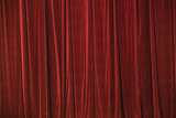 Red curtain in theatre.