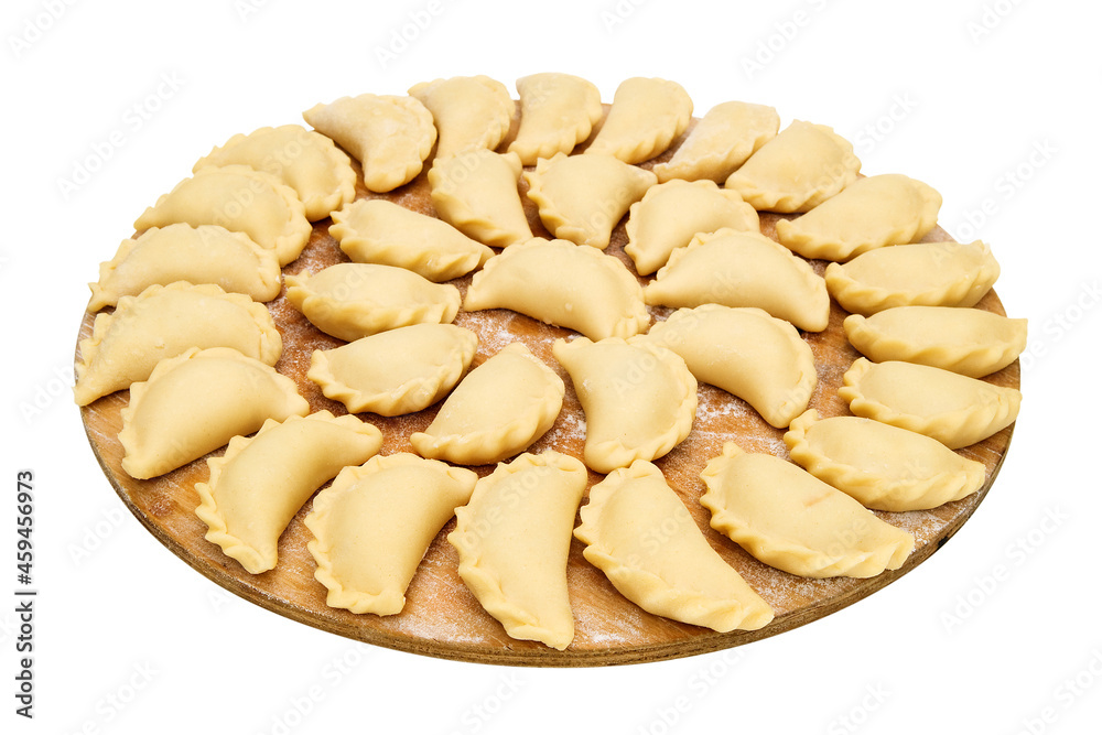 Large portion of homemade dumplings on a tray Large portion of homemade dumplings on a tray