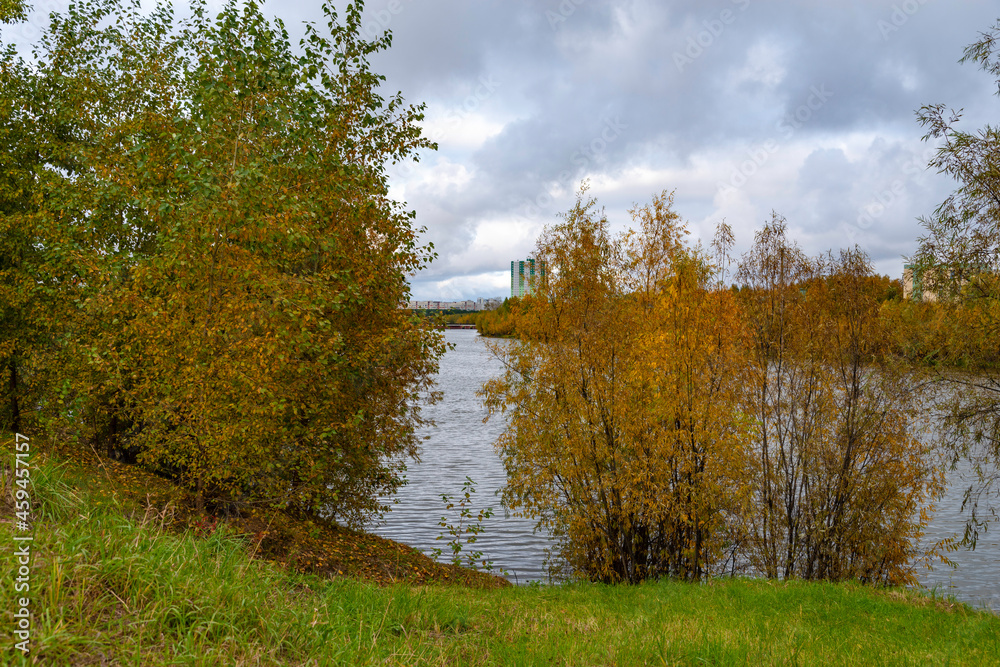 Surgut, Siberia/Russia - 09/25/2021: City views surrounded by autumn parks. Surgut, Siberia/Russia - 09/25/2021: City views surrounded by autumn parks.
