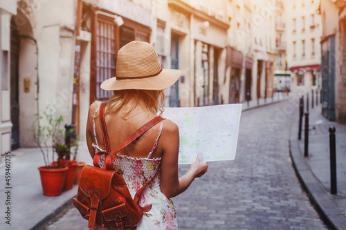travel to Europe, woman tourist with map on the street, tourism