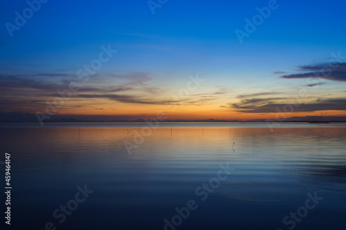 The twilight sky with star at the lake.