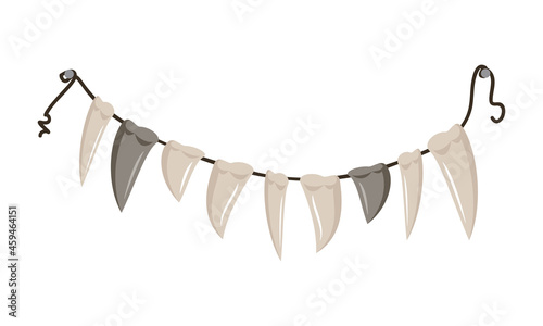 Beads of fangs and teeth hanging from a rope. Halloween party decoration or necklace