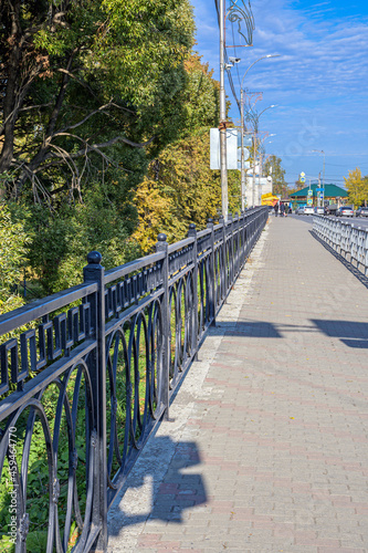 Fragment of a pedestrian bridge on an autumn day