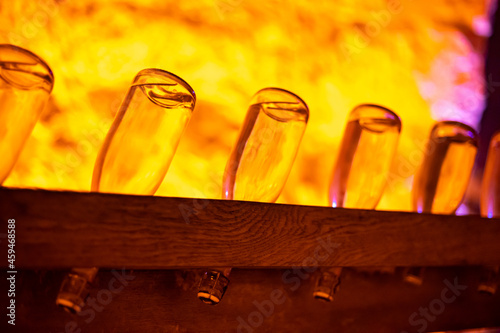 Visit of deep and long undergrounds caves for making champagne sparkling wine from chardonnay and pinor noir grapes in Reims, Champagne, France photo