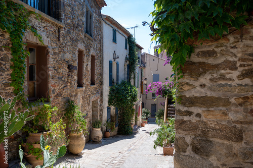 Walking on ancient french village Grimaud  touristic destination with ruines fortress castle on top  Var  Provence  France
