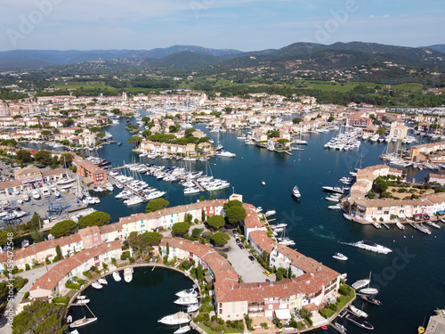 Aerial view on small houses and sailboats of Port Grimaud and port Cogolin, French Riviera, Provence, France