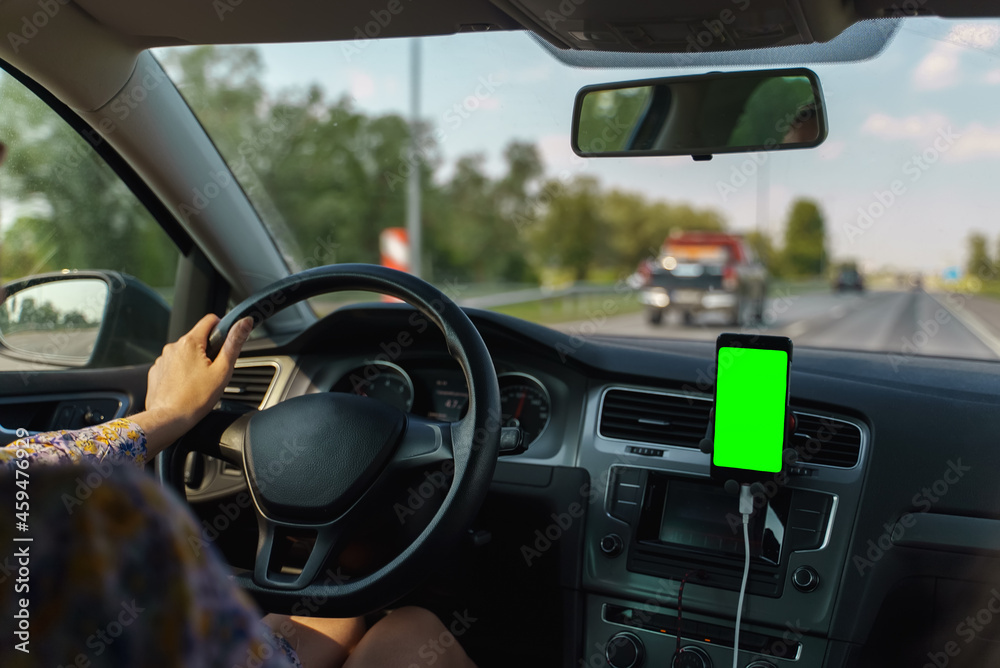 Woman driving car. Chroma key screen. Put your advertisement here. Woman driving car. Chroma key screen. Put your advertisement here.
