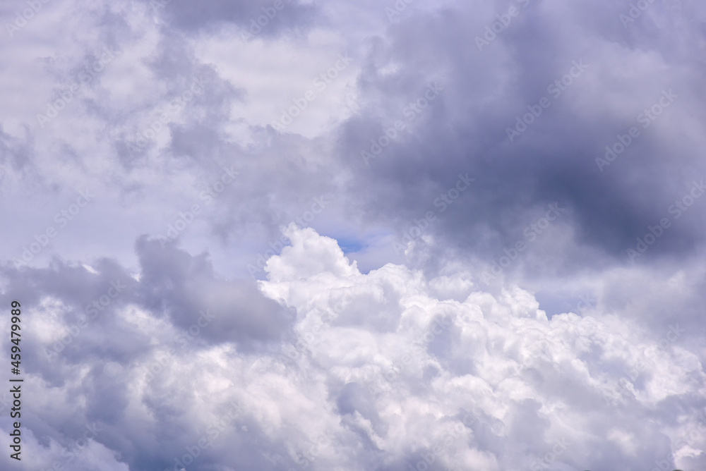 White clouds on blue sky background.