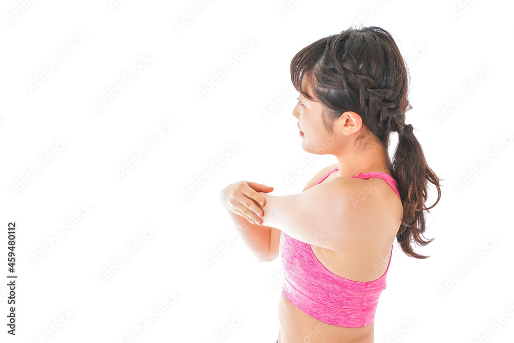 ウォーミングアップをする若い女性