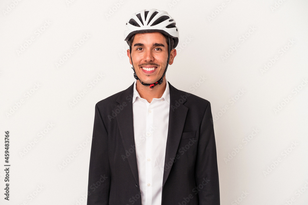 Young mixed race business man wearing a bike helmet isolated on white background happy, smiling and cheerful. Young mixed race business man wearing a bike helmet isolated on white background happy, smiling and cheerful.