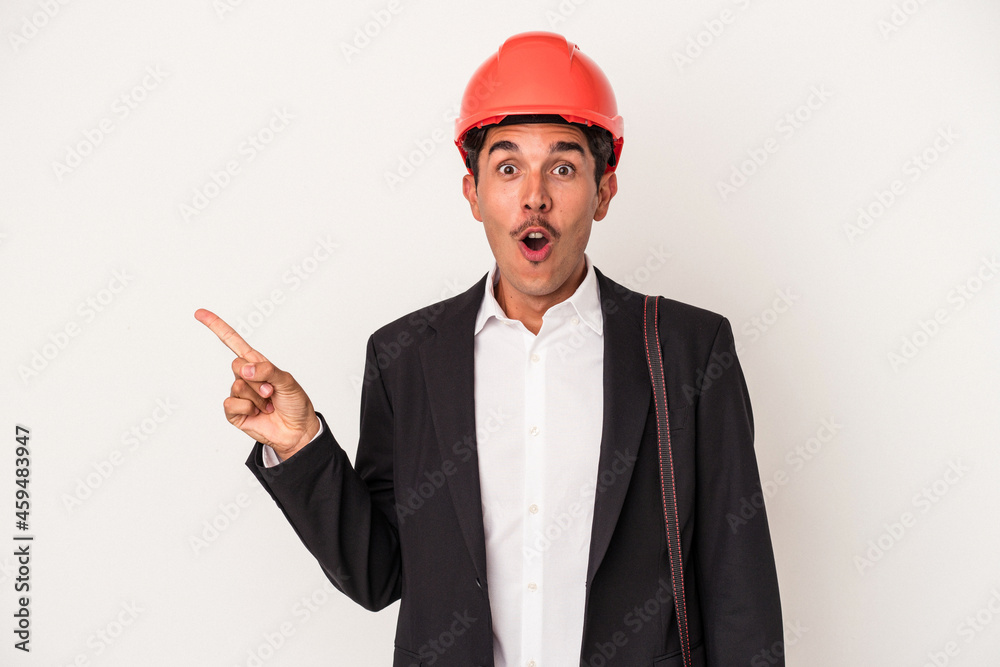 Young architect mixed race man isolated on white background pointing to the side Young architect mixed race man isolated on white background pointing to the side