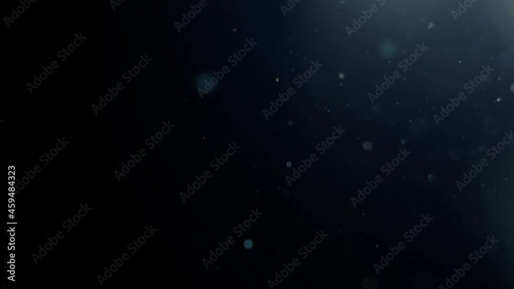 Background of natural floating dust particles backlit with lens flare