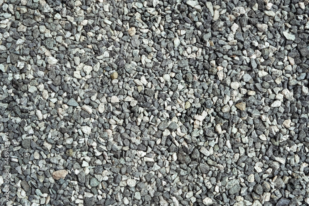 gray gravel stones abstract background. Pebble backdrop. crushed stones, construction rocks texture. top view gray gravel stones abstract background. Pebble backdrop. crushed stones, construction rocks texture. top view