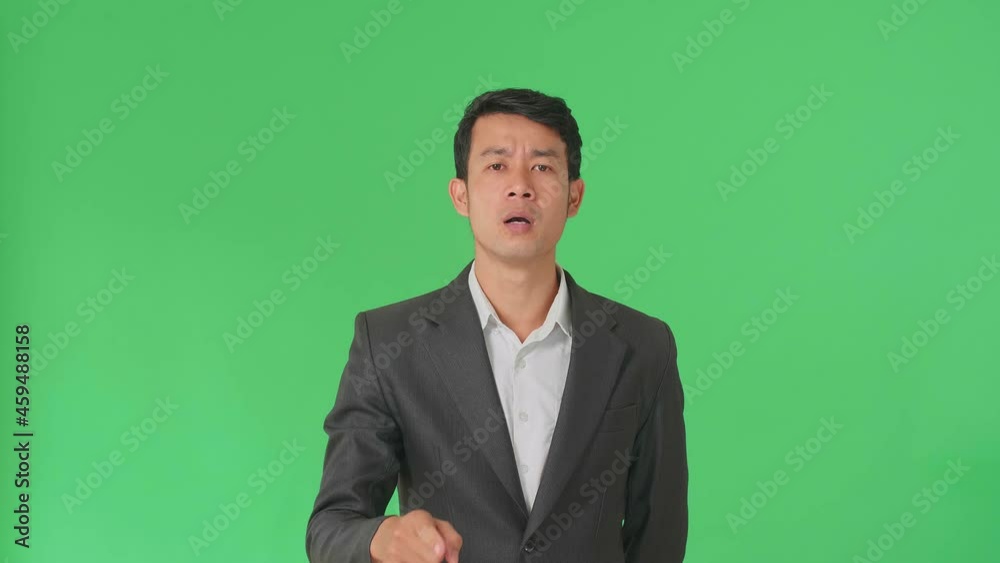 Asian Business Man Threatening With Finger In The Green Screen Studio
Asian Business Man Threatening With Finger In The Green Screen Studio