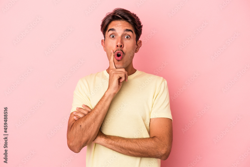 Young mixed race man isolated on white background having some great idea, concept of creativity. Young mixed race man isolated on white background having some great idea, concept of creativity.