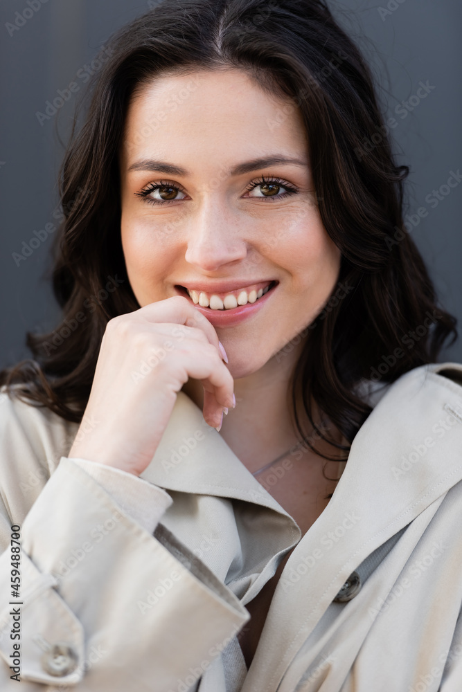 close up portrait of happy brunette woman smiling at camera outdoors close up portrait of happy brunette woman smiling at camera outdoors