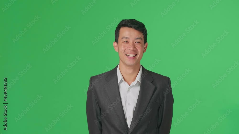 Smiling Asian Business Man Positively Shaking His Head At The Camera In The Green Screen Studio
Smiling Asian Business Man Positively Shaking His Head At The Camera In The Green Screen Studio