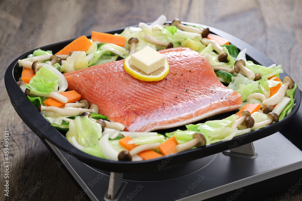 Japanese cooking; Hokkaido style salmon chanchan yaki, stir fried salmon and vegetables, seasoned with miso sauce.