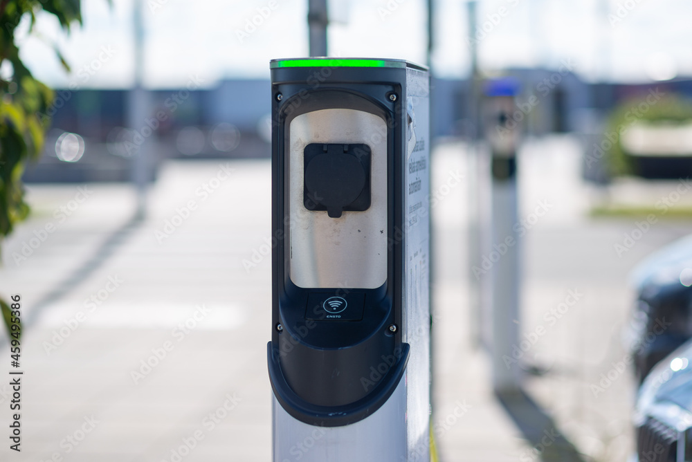 Electric car charging station at a parking lot Electric car charging station at a parking lot