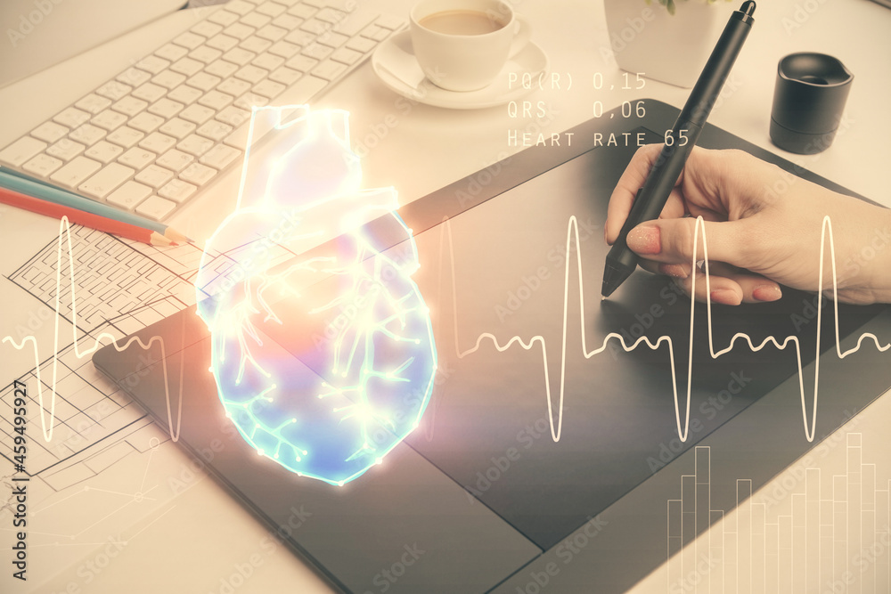 Double exposure of heart sketch hologram and woman holding and using a mobile device. Medical education concept. Double exposure of heart sketch hologram and woman holding and using a mobile device. Medical education concept.