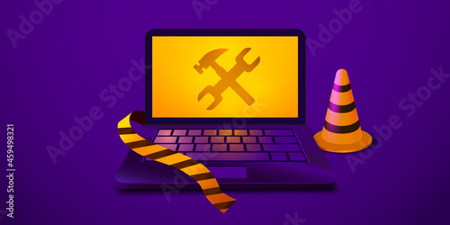 Laptop with wrench and hammer on the screen. Computer repair service, maintenance, technical support. Website is under construction.