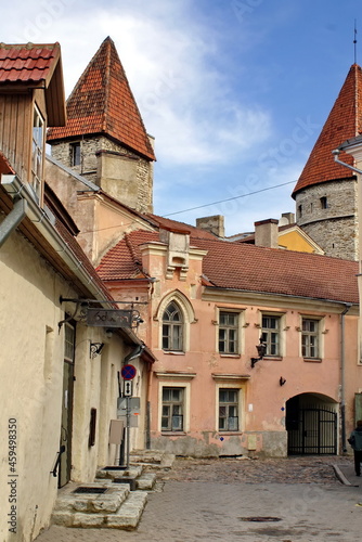 Buildings under the towers of the old city walls in the Old Town, Tallinn, Estonia