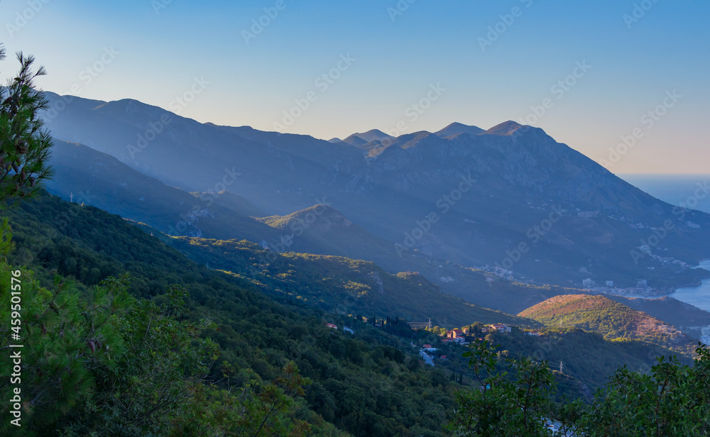 Picturesque panoramic top view of the mountain slopes in the vicinity of Budva and Sveti Stefan, view from the observation deck Picturesque panoramic top view of the mountain slopes in the vicinity of Budva and Sveti Stefan, view from the observation deck