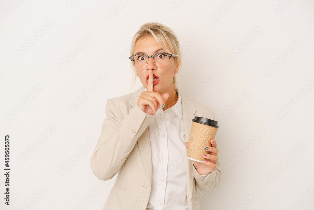 Young business Russian woman holding take away coffee isolated on white background keeping a secret or asking for silence. Young business Russian woman holding take away coffee isolated on white background keeping a secret or asking for silence.