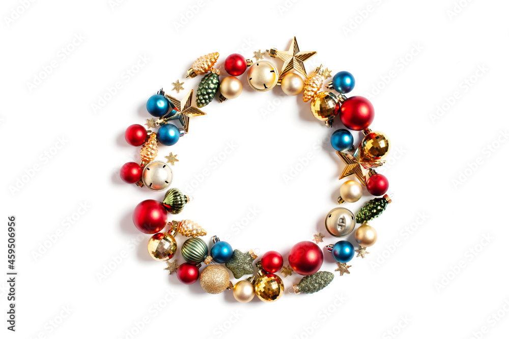 Obraz premium Festive wreath of Christmas decoration, vibrant composition on white