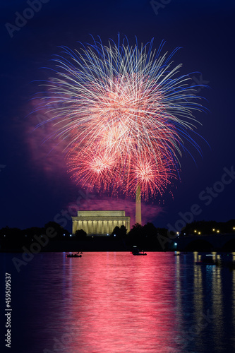 The Show Begins - Fourth of July Fireworks Over the Lincoln Memorial and Washington Monument Reflected in the Potomac River.  