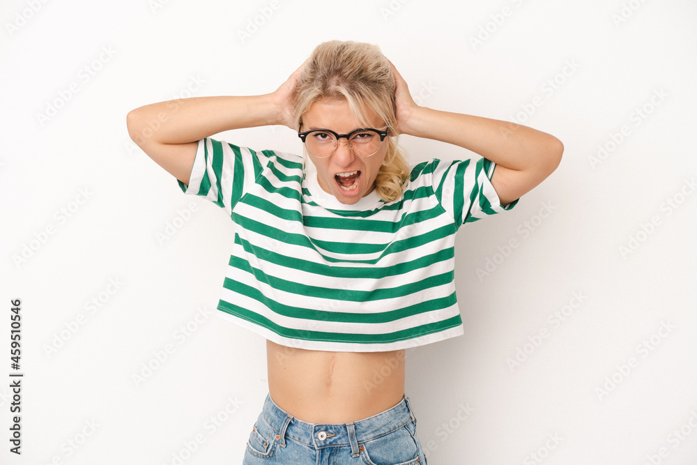 Young Russian woman isolated on white background screaming, very excited, passionate, satisfied with something. Young Russian woman isolated on white background screaming, very excited, passionate, satisfied with something.